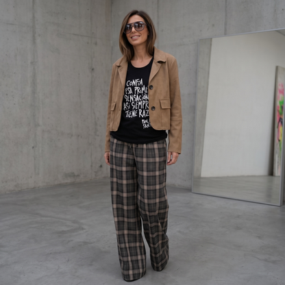 Musculosa oversize unisex "Confía en esa primera sensación. Casi siempre tiene razón"